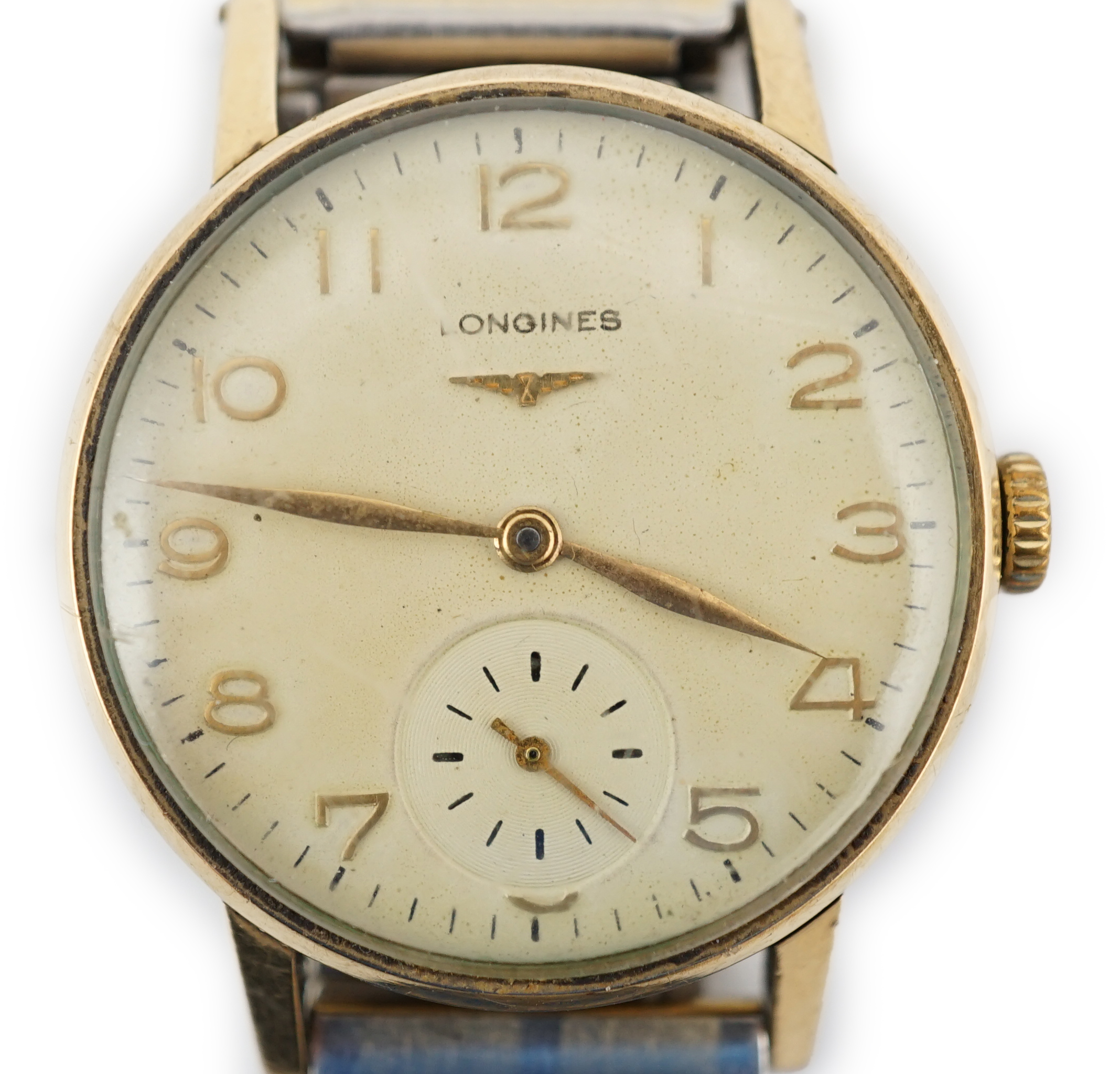 A gentleman's late 1950's 9ct gold Longines manual wind wrist watch